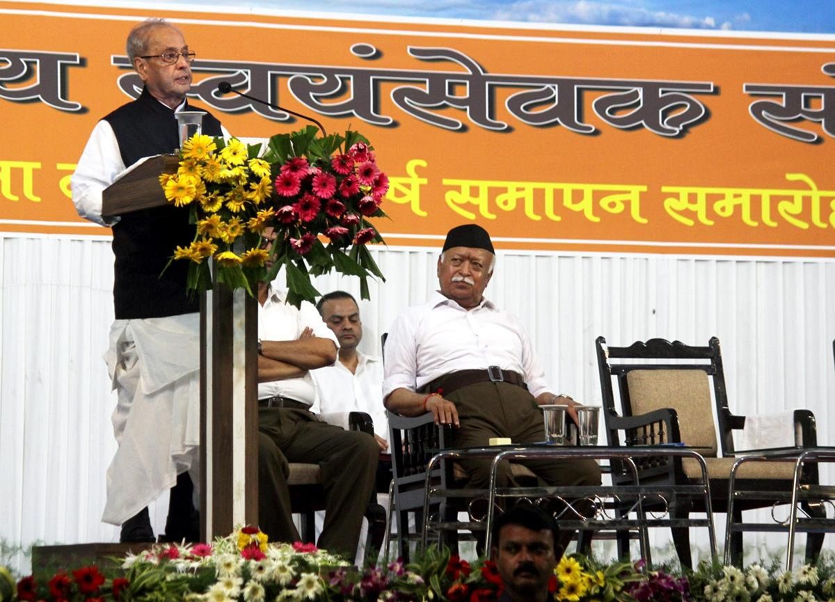 Former president Pranab Mukherjee speaks during the closing ceremony of ‘Tritiya Varsha Sangh Shiksha Varg’, an (RSS) event to mark the conclusion of a three-year training camp for Swayamsevaks, in Nagpur on Thursday, June 07, 2018. Rashtriya Swayamsevak Sangh (RSS) chief Mohan Bhagwat is also seen. (PTI Photo)