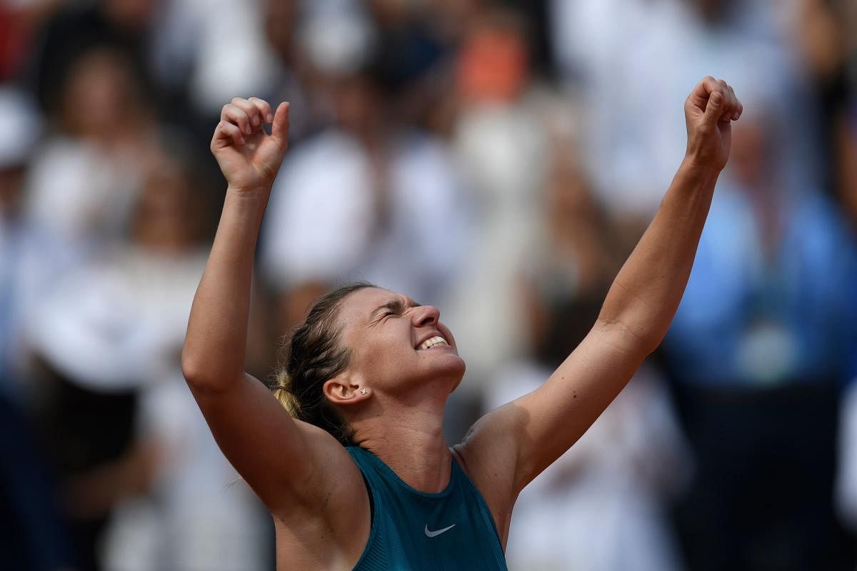 Romania's Simona Halep celebrates her win over Sloane Stephens in the final of the French Open on Saturday. AFP