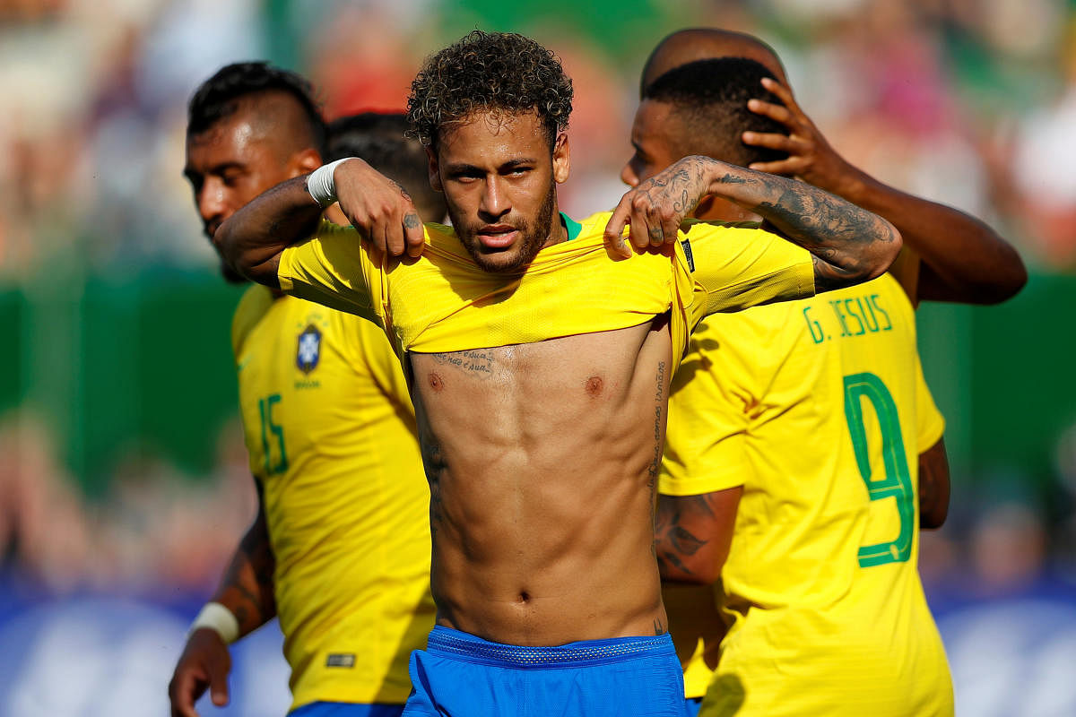 Brazil's Neymar celebrates after scoring against Austria in their international friendly game on Sunday. REUTERS