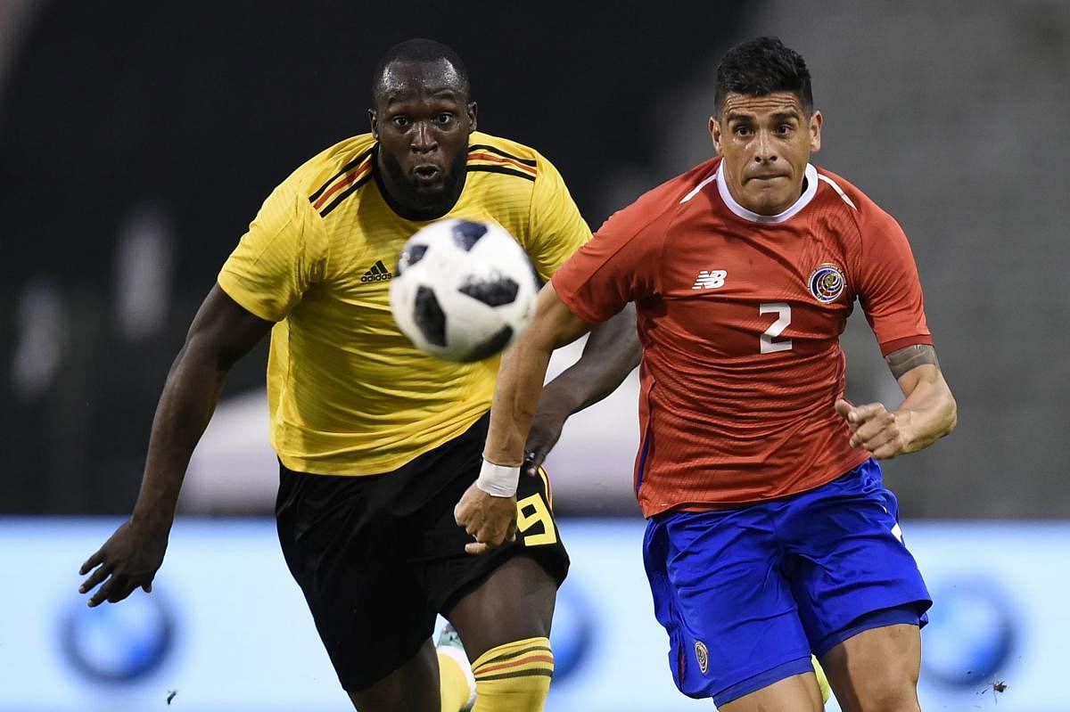 Belgian forward Romelu Lukaku (left) and Costa Rica's Johnny Acosta vie for possession during their friendly in Brussels on Monday. AFP