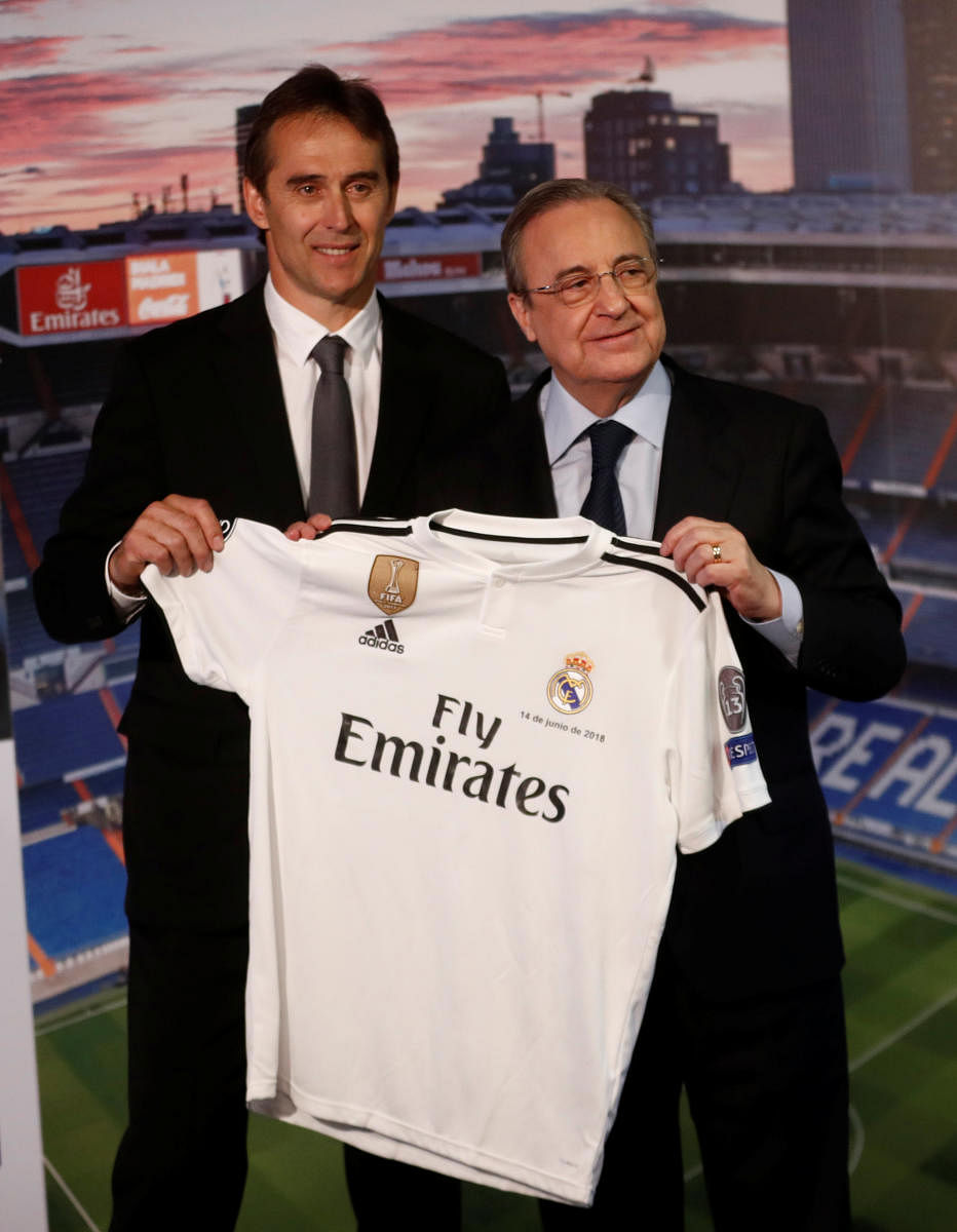 NEW INNINGS Real Madrid president (right) present new coach Julen Lopetegui at the Santiago Bernabeu on Thursday. REUTERS