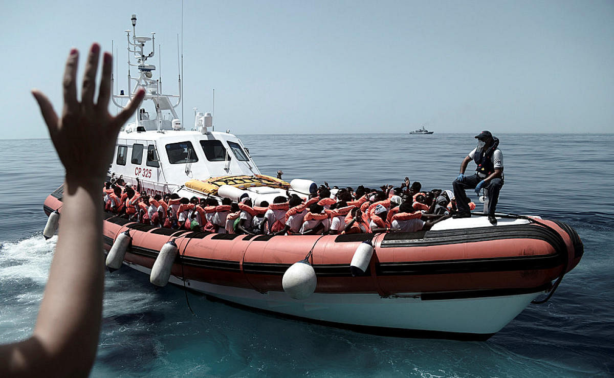 Migrants are seen after being rescued by MV Aquarius, a search and rescue ship run in partnership between SOS Mediterranee and Medecins Sans Frontieres in the central Mediterranean Sea. (Reuters photo)