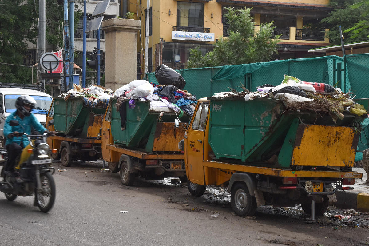 Heavy garbage is seen due to not clear in front of BSNL exchange, Bazaar street, Halasuru in Bengaluru on Wednesday. Photo by S K Dinesh