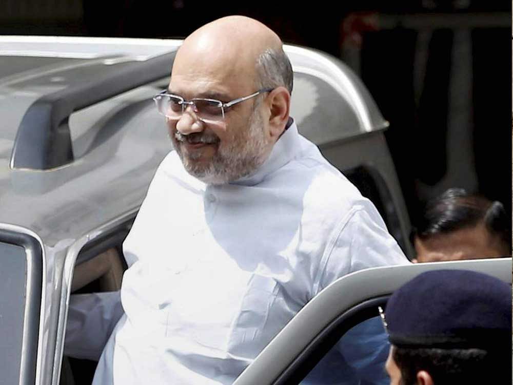 Amit Shah eld a meeting with 'cyber warriors' and discussed with them on how to take on the Congress. PTI file photo.