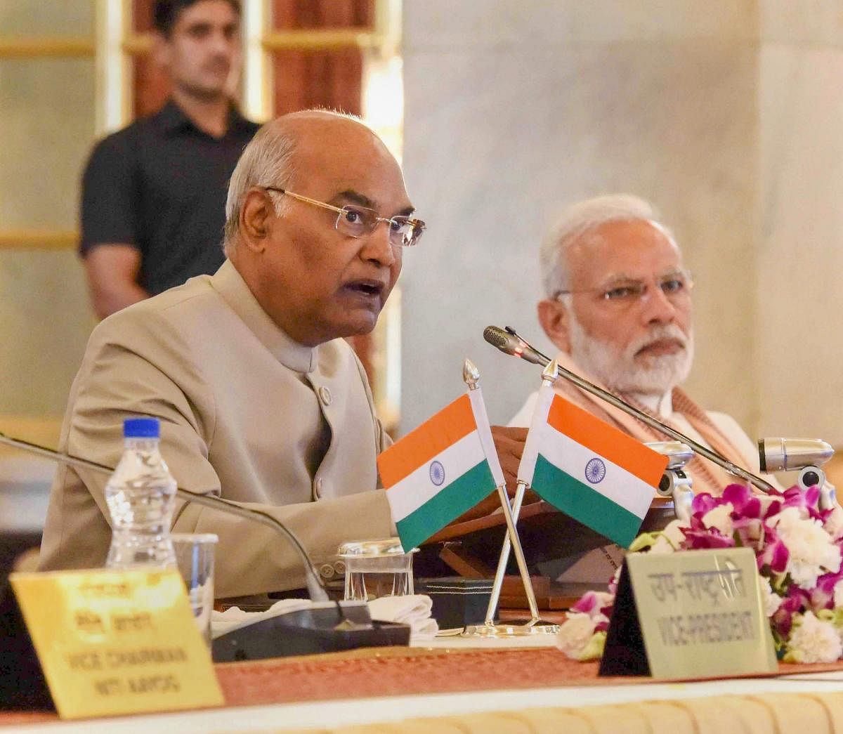 President Ram Nath Kovind speaks as Prime Minister Narendra Modi looks on, during the second day of the Conference of Governors at Rashtrapati Bhavan, in New Delhi. PTI Photo