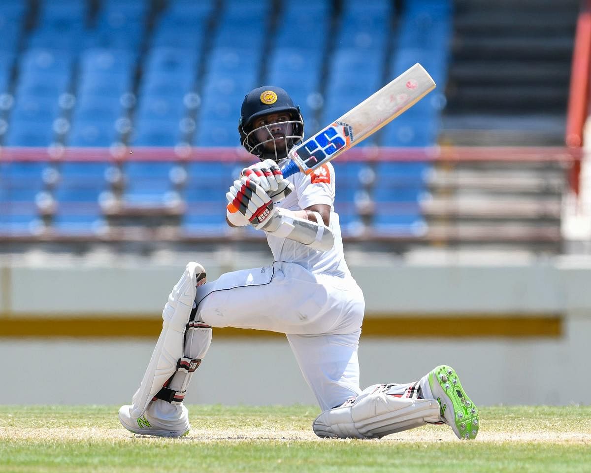Kusal Mendis of Sri Lanka hits a boundary during his innings of 87 against the West Indies at Gros Islet, St. Lucia, on Sunday. (AFP Photo)
