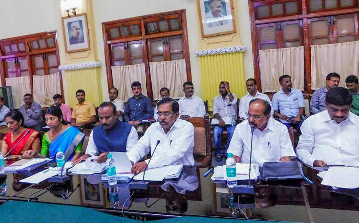 Deputy Chief Minister G Parameshwara (centre) during a meeting with the city legislators, MPs and officials at the Vidhana Soudha on Monday.
