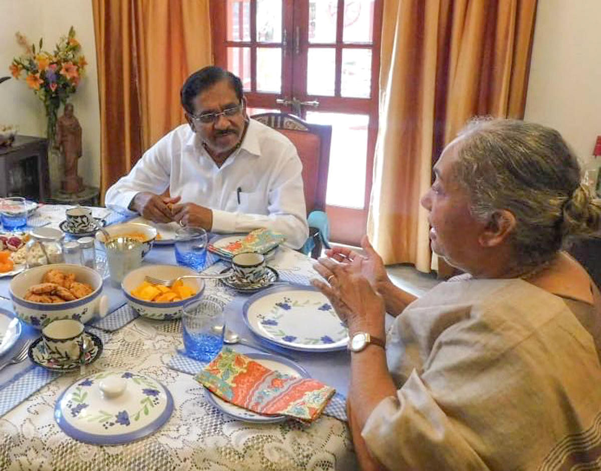 Deputy Chief Minister G Parameshwara has a chat over tea with senior Congress leader Margret Alva at her residence on Monday.