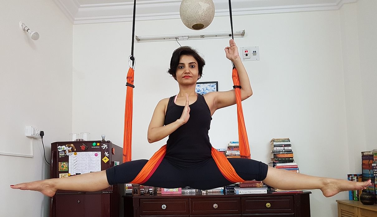 Aparna Pathak doing aerial yoga.