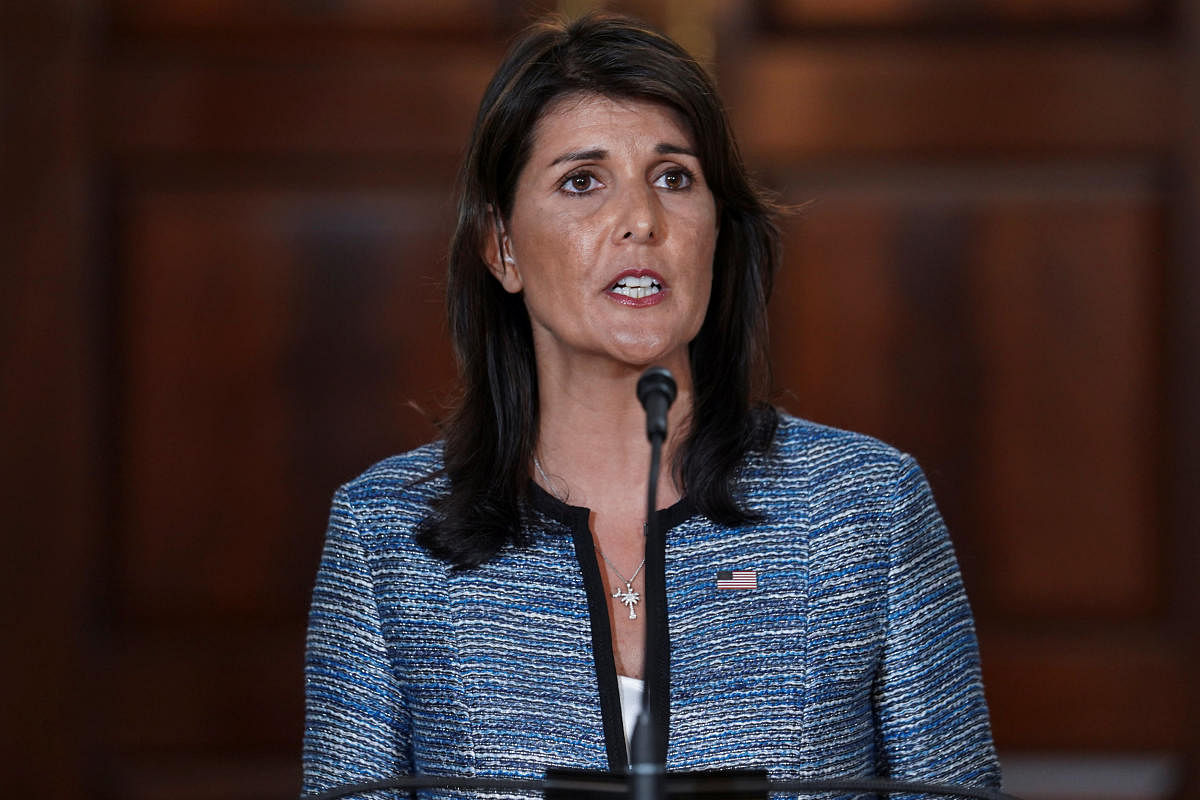 US Ambassador to the United Nations Nikki Haley delivers remarks to the press together with US Secretary of State Mike Pompeo (not pictured), announcing the U.S.'s withdrawal from the U.N's Human Rights Council at the Department of State in Washington. (REUTERS/Toya Sarno Jordan)