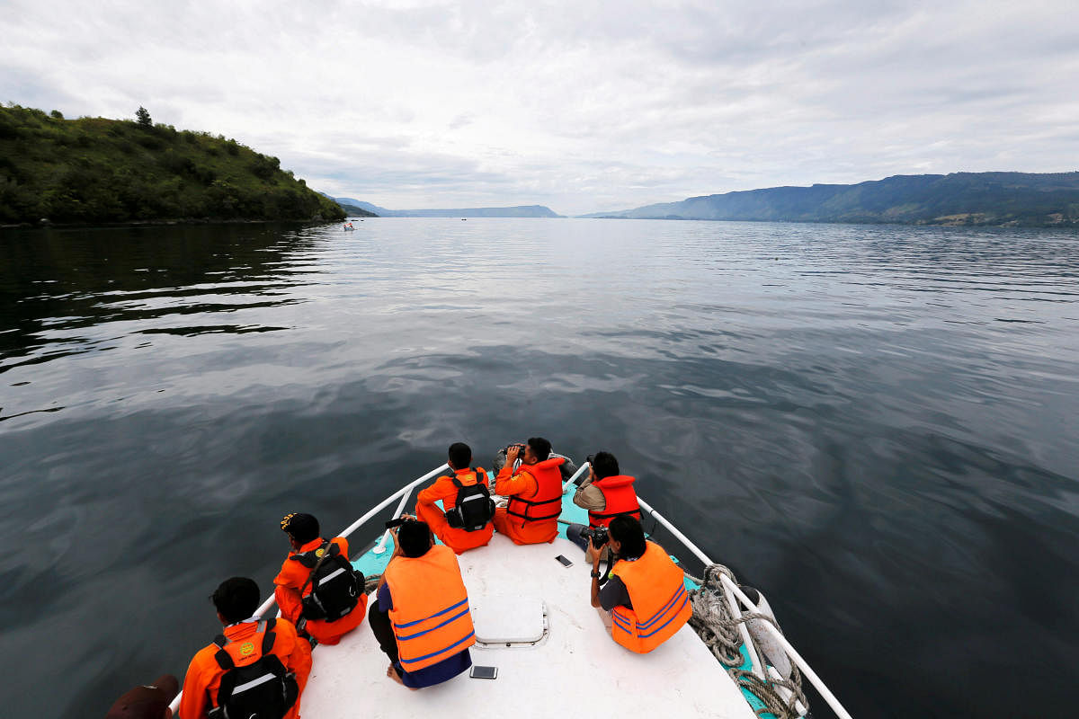 Search and rescue personnel look for missing passengers from Monday's ferry accident at Lake Toba in Simalungun. Reuters photo