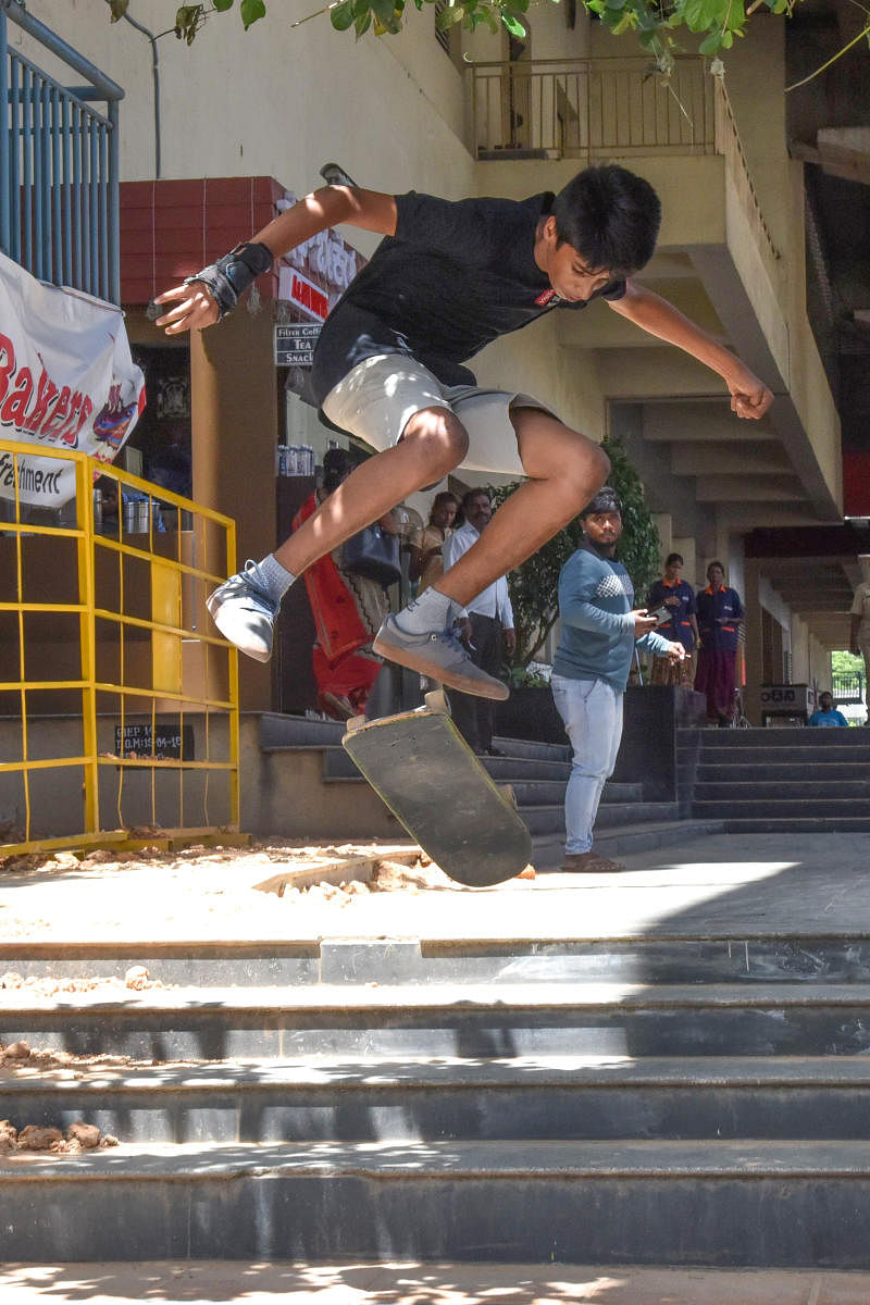 A youth skateboards on MG Road on Thursday. DH Photo