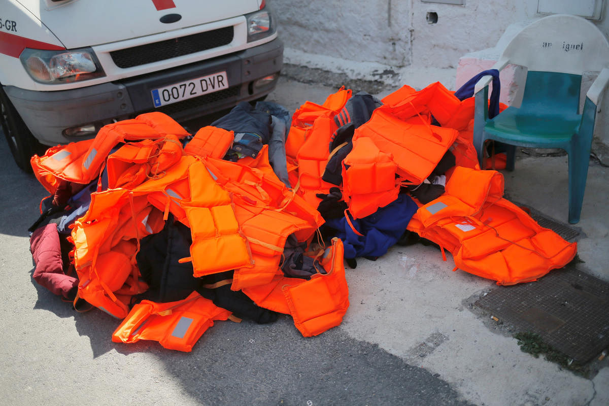 Life-vests of migrants, part of a group intercepted aboard two dinghies off the coast in the Mediterranean Sea, are seen on the floor after arriving on a rescue boat at the port of Motril, Spain June 21, 2018. (REUTERS/Jon Nazca)