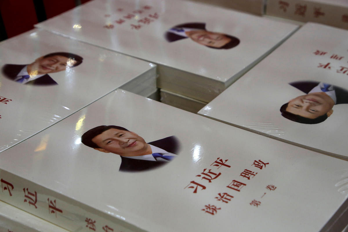 Copies of book "Xi Jinping: The governance of China" are displayed for sale at a bookstore in Beijing, China, March 1, 2018. REUTERS