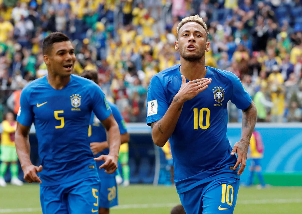 Brazil's Neymar celebrates scoring their second goal. REUTERS