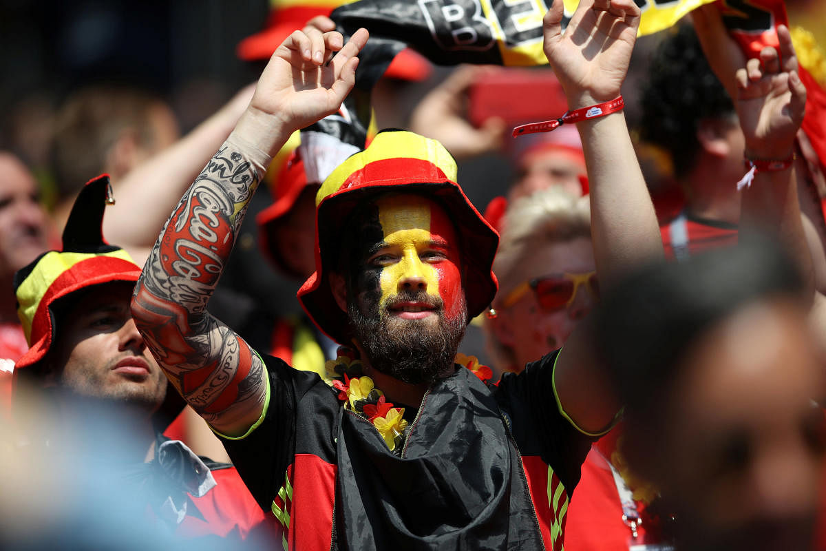 Belgium fan with face paint before the match REUTERS