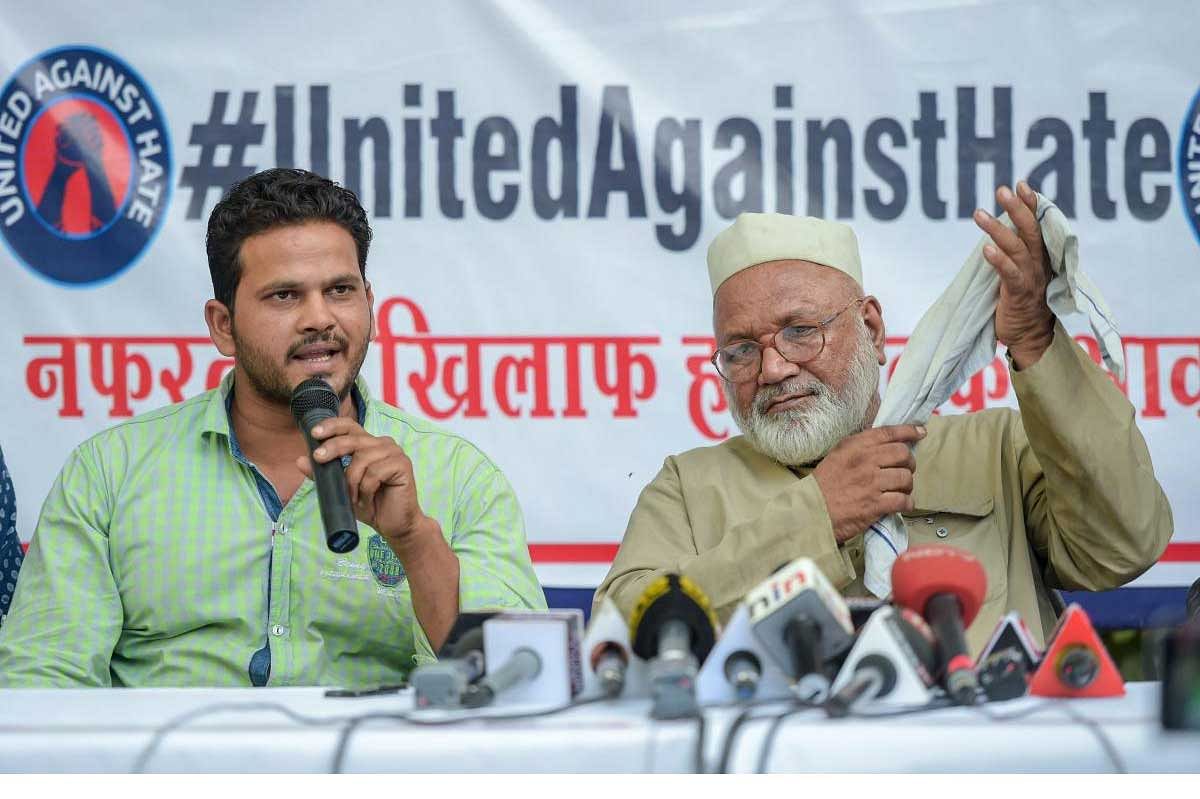 Nasim (L) brother of Md Kasim (45) who was lynched in Hapur allegedly over cow slaughter, speaks during a press conference, at Press Club in New Delhi on Friday, June 22, 2018. Meheruddin (R) brother of Samayuddin is also seen. PTI Photo