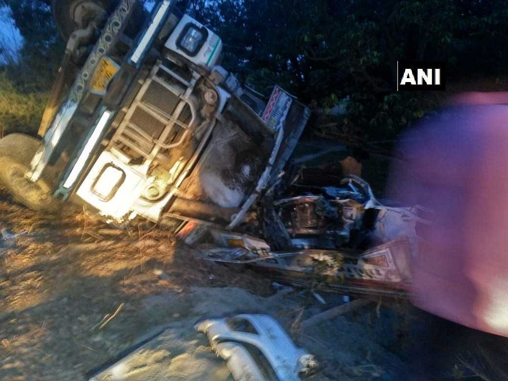 The car was on its way to Bangarmau last night when the truck driver, coming from the opposite direction, lost control over the vehicle following which it overturned. (ANI/Twitter)