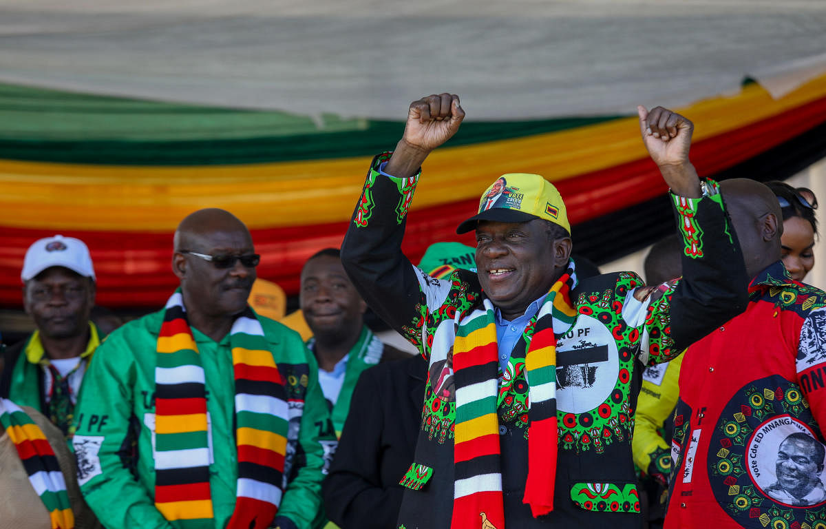 Emmerson Mnangagwa greets supporters before an explosion at an election rally in Bulawayo, Zimbabwe. Reuters file photo