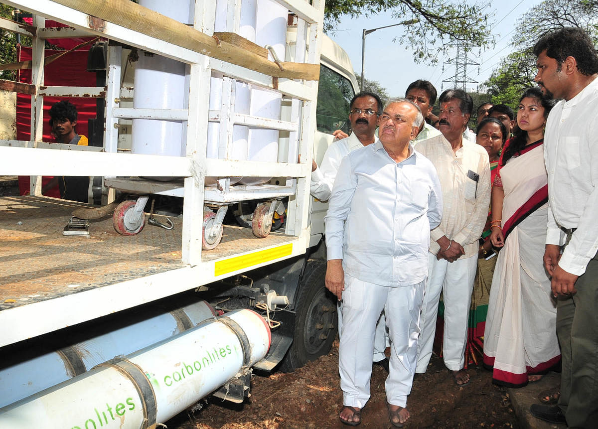 A DH file photo of former minister Ramalinga Reddy inaugurating a waste-to-energy plant in Koramangala.