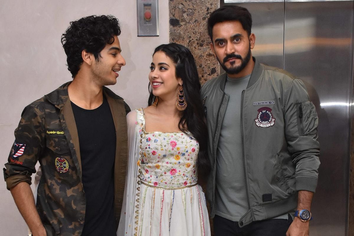 Janhvi Kapoor and Ishaan Khatter with director of Dhadak. (PTI photo)