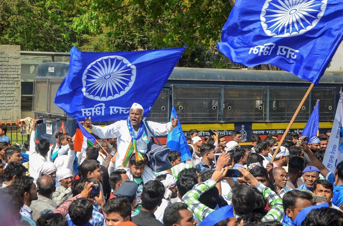 People participate in 'Elgar March' led by Bharip Bahujan Mahasangh (BBM) President Prakash Ambedkar(unseen), organised to demand arrest of Hindutva leader Sambhaji Bhide for his alleged involvement in the Bhima-Koregaon violence that took place in Januar