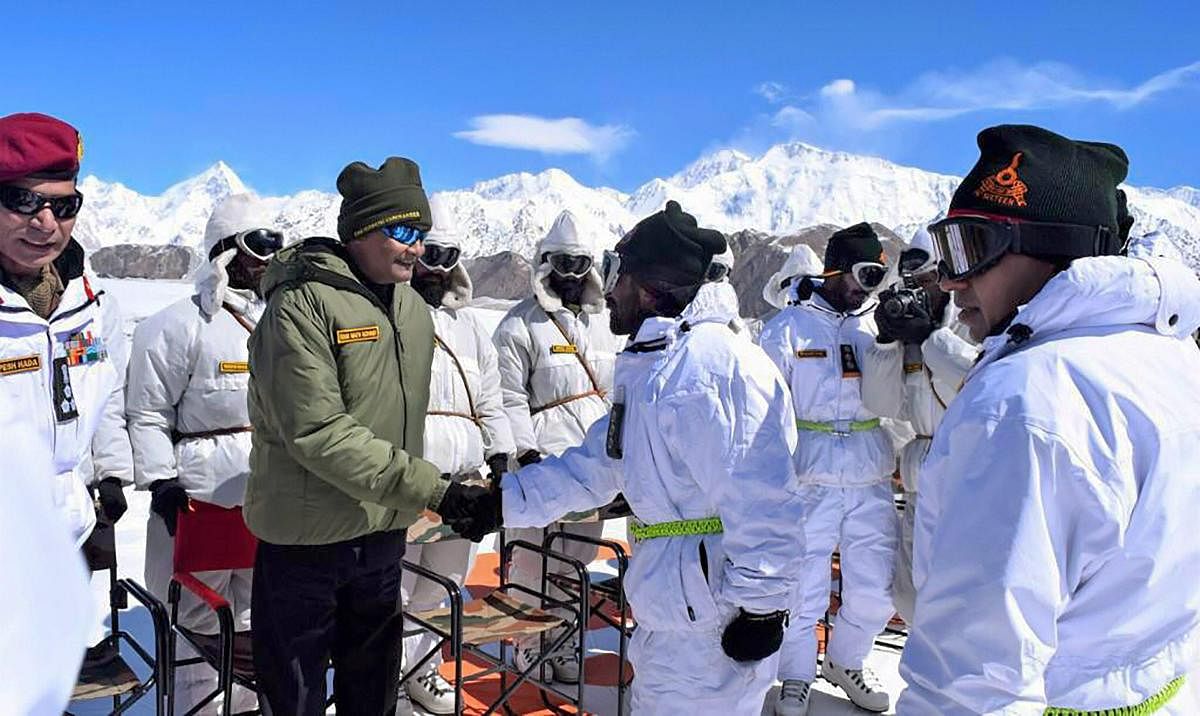 President Ram Nath Kovind shakes hands with soldiers posted at Siachen Base Camp on Thursday. (PTI file photo)