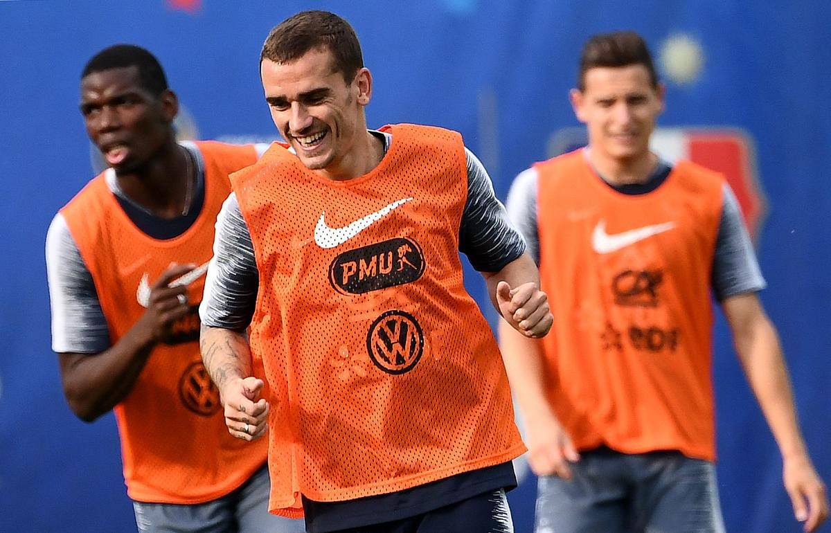 SLOW-STARTER: France's Antoine Griezmann (centre) hasn't fired yet in this World Cup. AFP 