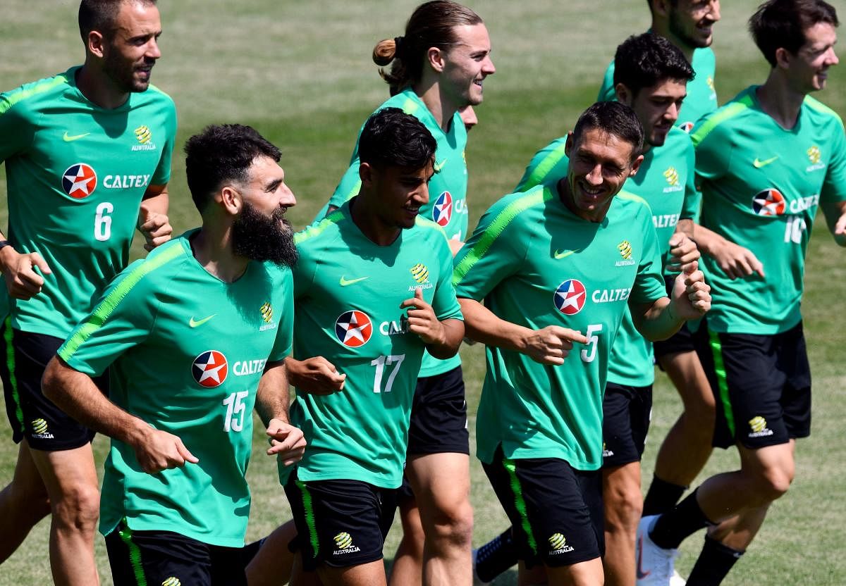 Australia will have to look beyond their skipper Mile Jedinak (left) to score goals for them against Peru. AFP