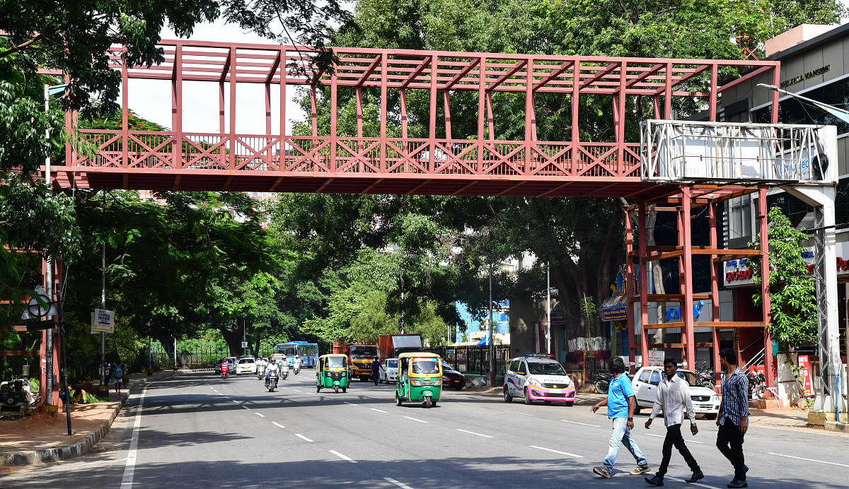 In an apparent attempt to avert a public backlash, the BBMP built a skywalk on Raja Ram Mohan Roy Road on Sunday night. dh photo/ANAND BAKSHI