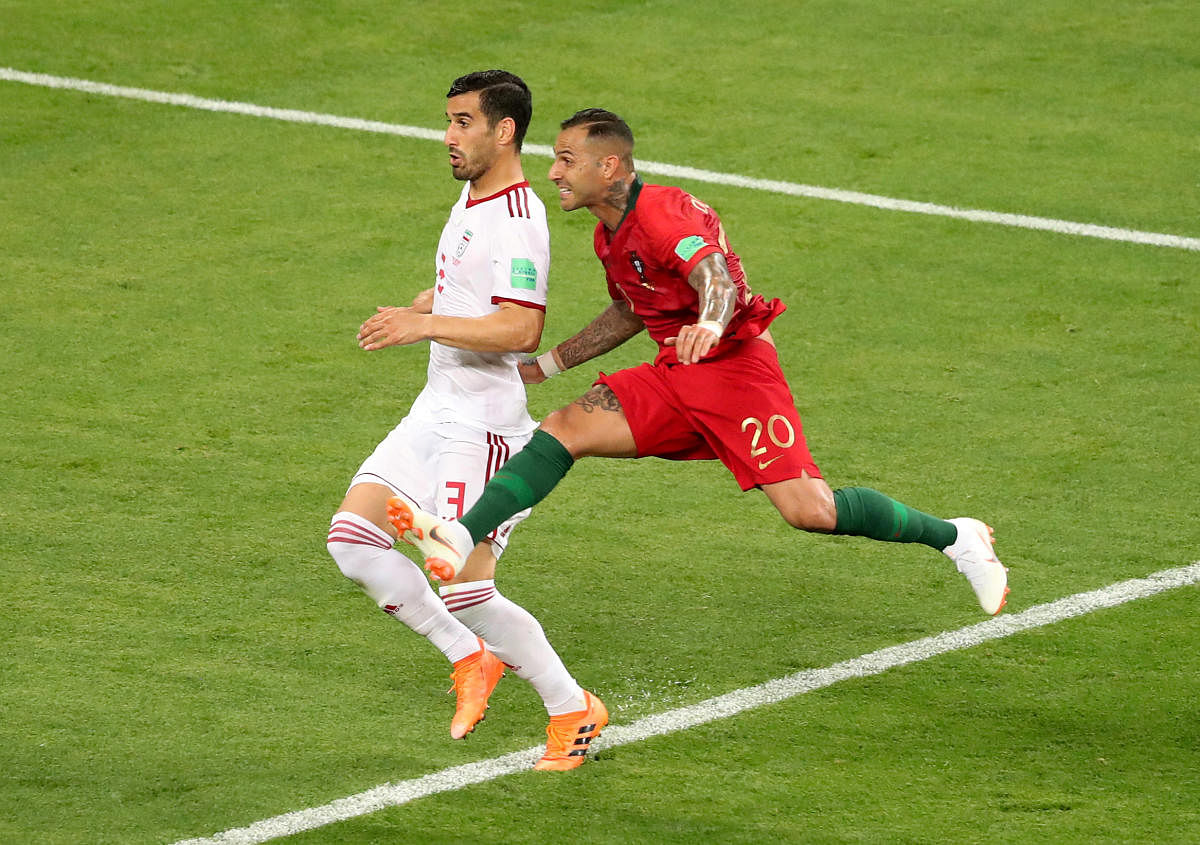 Portugal's Ricardo Quaresma fires his team's first goal against Iran on Monday. REUTERS