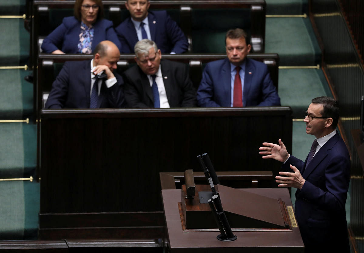 Poland's Prime Minister Mateusz Morawiecki speaks during a debate about the Holocaust bill at lower house of Parliament in Warsaw, Poland. (Reuters Photo)