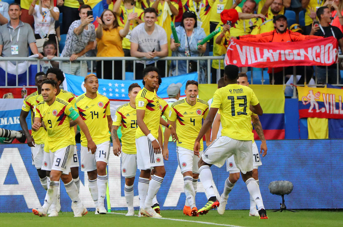  Colombia's Yerry Mina celebrates scoring their first goal with teammates REUTERS
