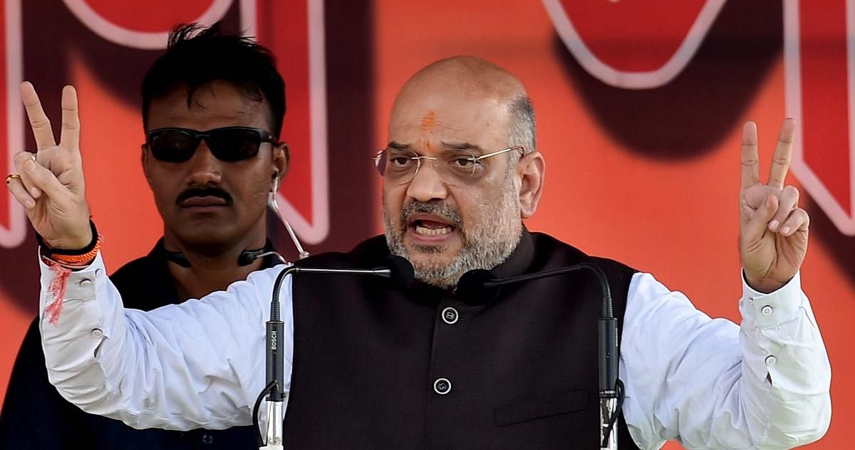 BJP National President Amit Shah addresses a public rally, in Purulia district of West Bengal on Thursday, June 28, 2018. (PTI Photo)