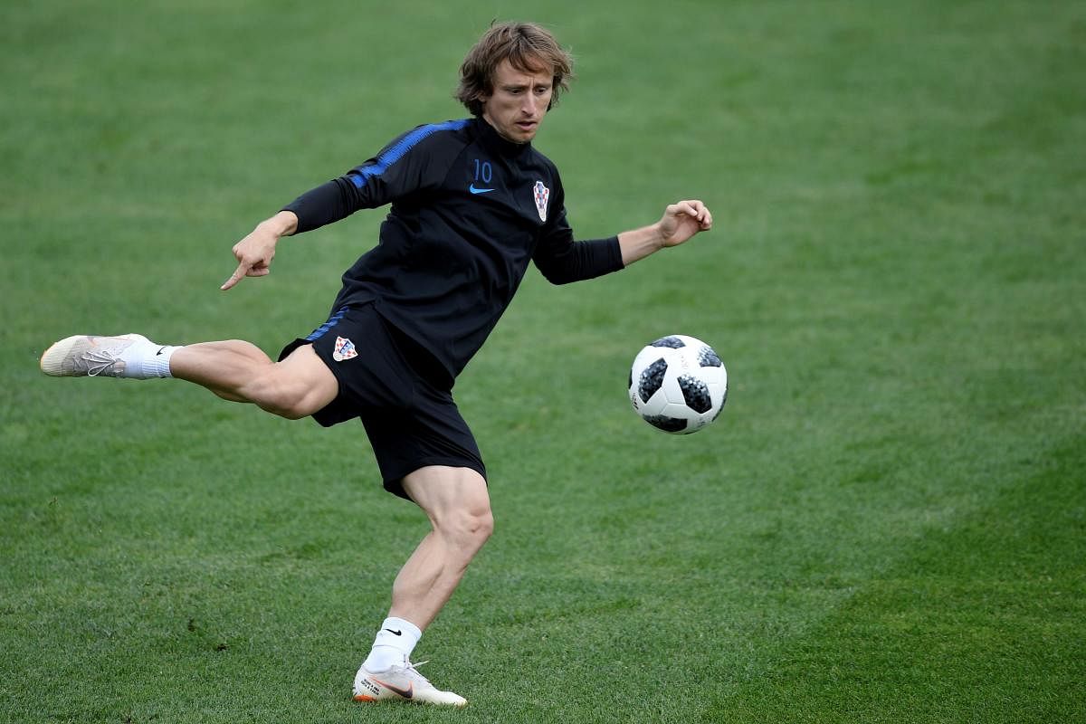GENIUS: Croatia skipper Luka Modric will be eyeing another dazzling show against Denmark on Sunday. AFP