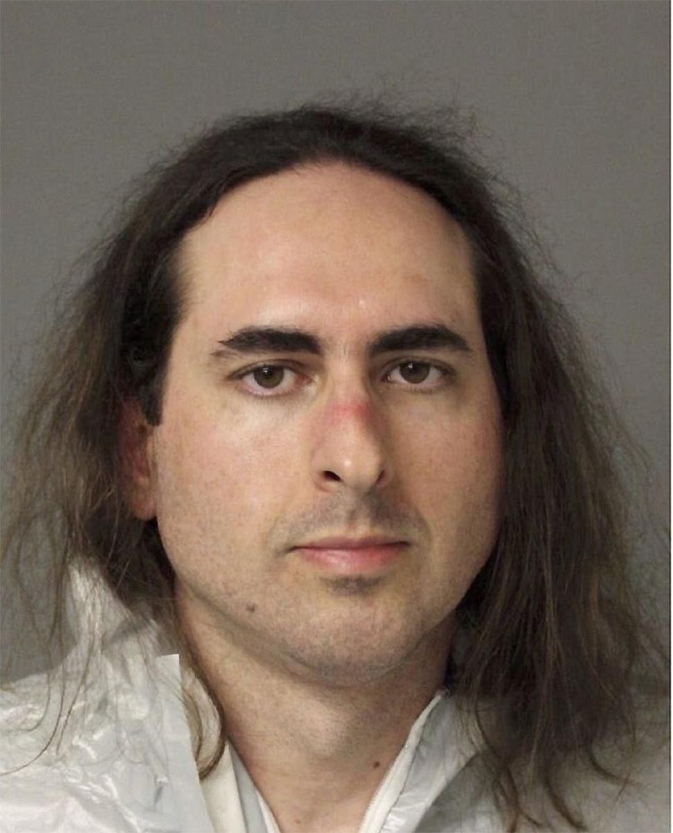 In this June 28, 2018, photo released by the Anne Arundel Police, Jarrod Warren Ramos poses for a photo, in Annapolis, Md. First-degree murder charges were filed Friday against Ramos who police said targeted Maryland's capital newspaper, shooting his way