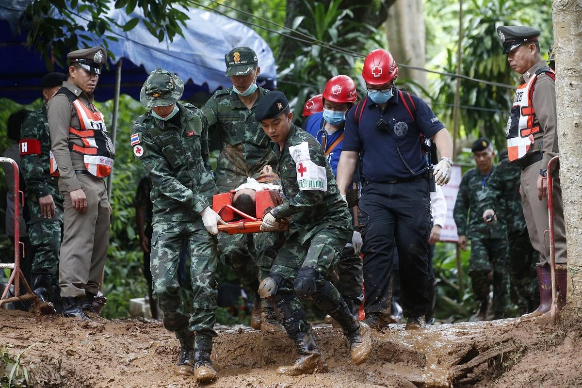 Rescuers have been searching for 12 boys and their soccer coach missing for seven days in the flooded cave complex. AP/PTI Photo