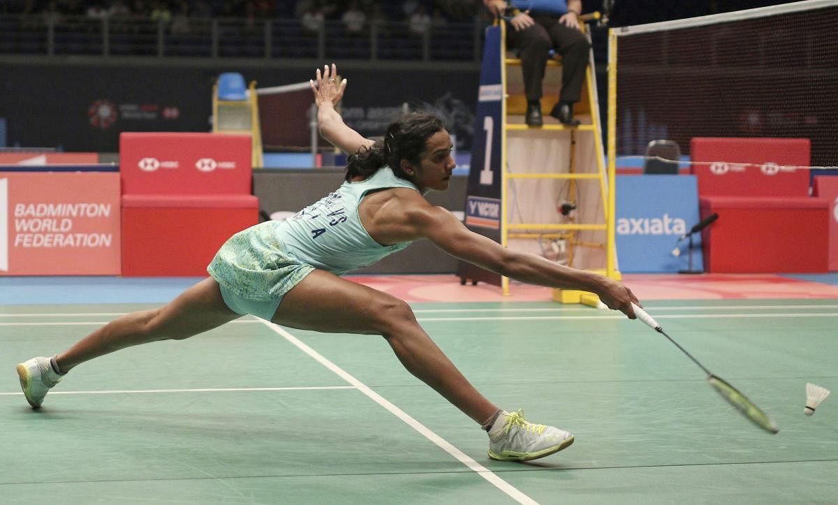 India's Pusarla V. Sindhu returns a shot to Taiwan's Tai Tzu Ying during women's single's semifinal match at the Malaysia Badminton Open in Kuala Lumpur. AP/PTI Photo