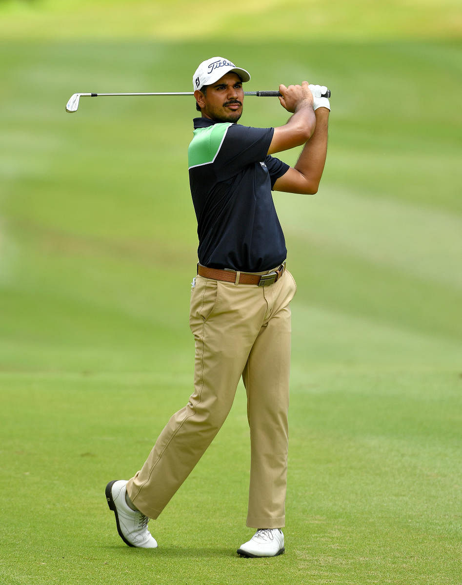 ROCK STEADY: Gaganjeet Bhullar drives during the third round of the Queen’s Cup on Saturday. AFP