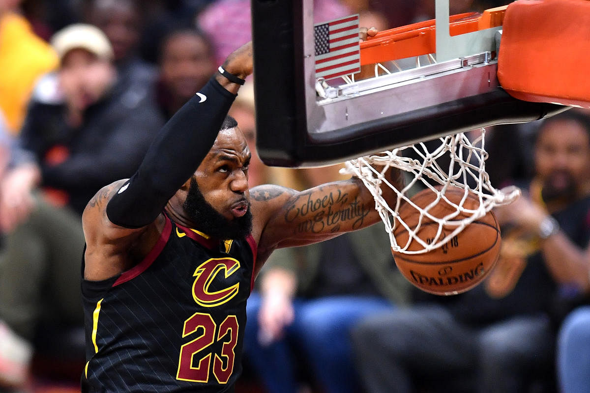 LeBron James #23 of the Cleveland Cavaliers dunks against the Golden State Warriors in the first quarter during Game Three of the 2018 NBA Finals at Quicken Loans Arena in Cleveland, Ohio. (AFP File Pic)