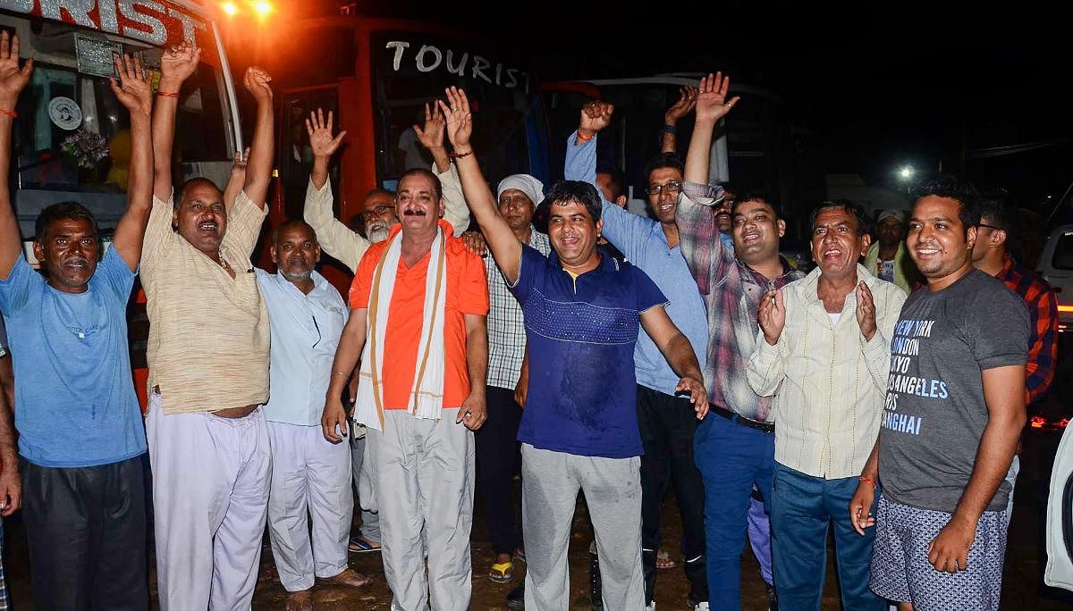 Pilgrims raise slogans as they leave for Amarnath Yatra, in Jammu on Tuesday. PTI photo