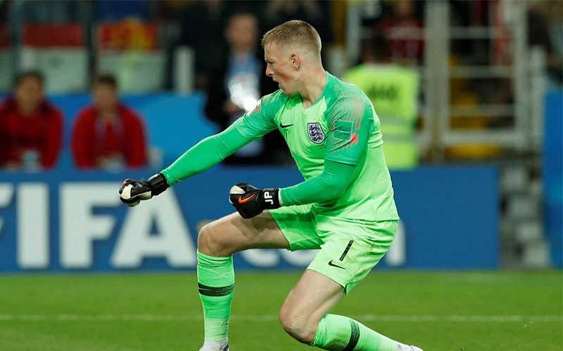 Jordan Pickford celebrates after saving a penalty during the shootout against Colombia. (Reuters Photo)