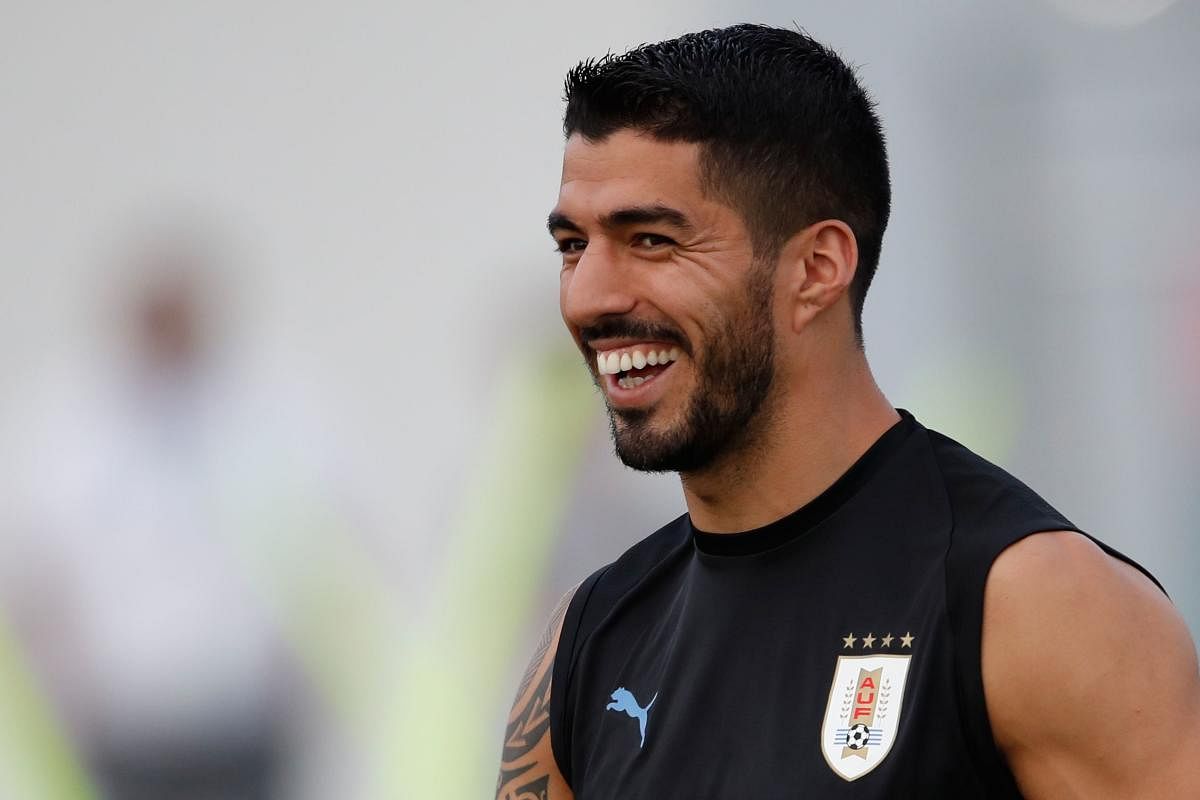  Infamous for his antics, Luis Suarez has mellowed down considerably at this World Cup, donning the role of a mentor for juniors in the Uruguay team. AFP