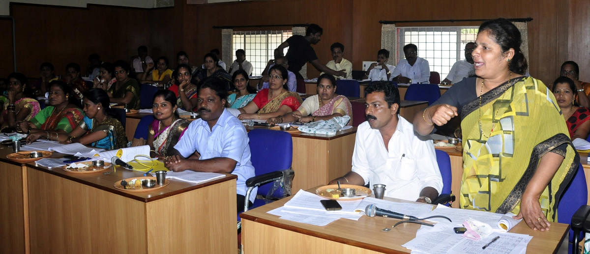 Taluk Panchayat member Sunitha raises a point during a TP meeting in Udupi on Wednesday.