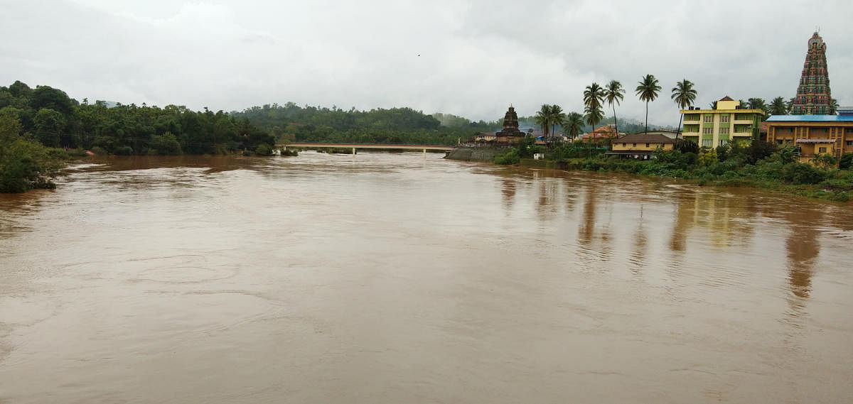 River Tunga is in spate in Sringeri on Thursday, following continuous rain.