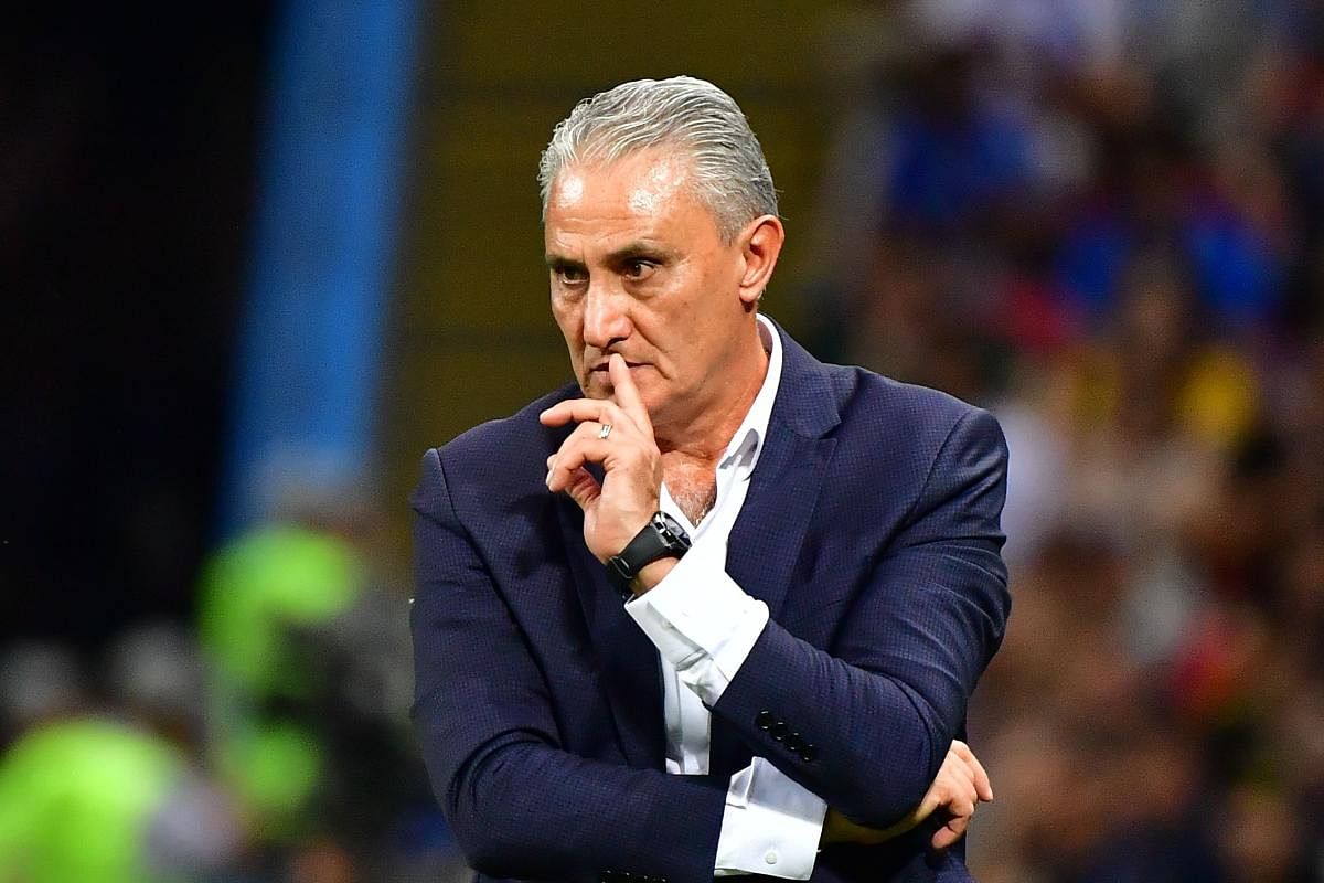 Brazil's coach Tite is undecided on his future with the team after the South Americans' exit from the World Cup. AFP
