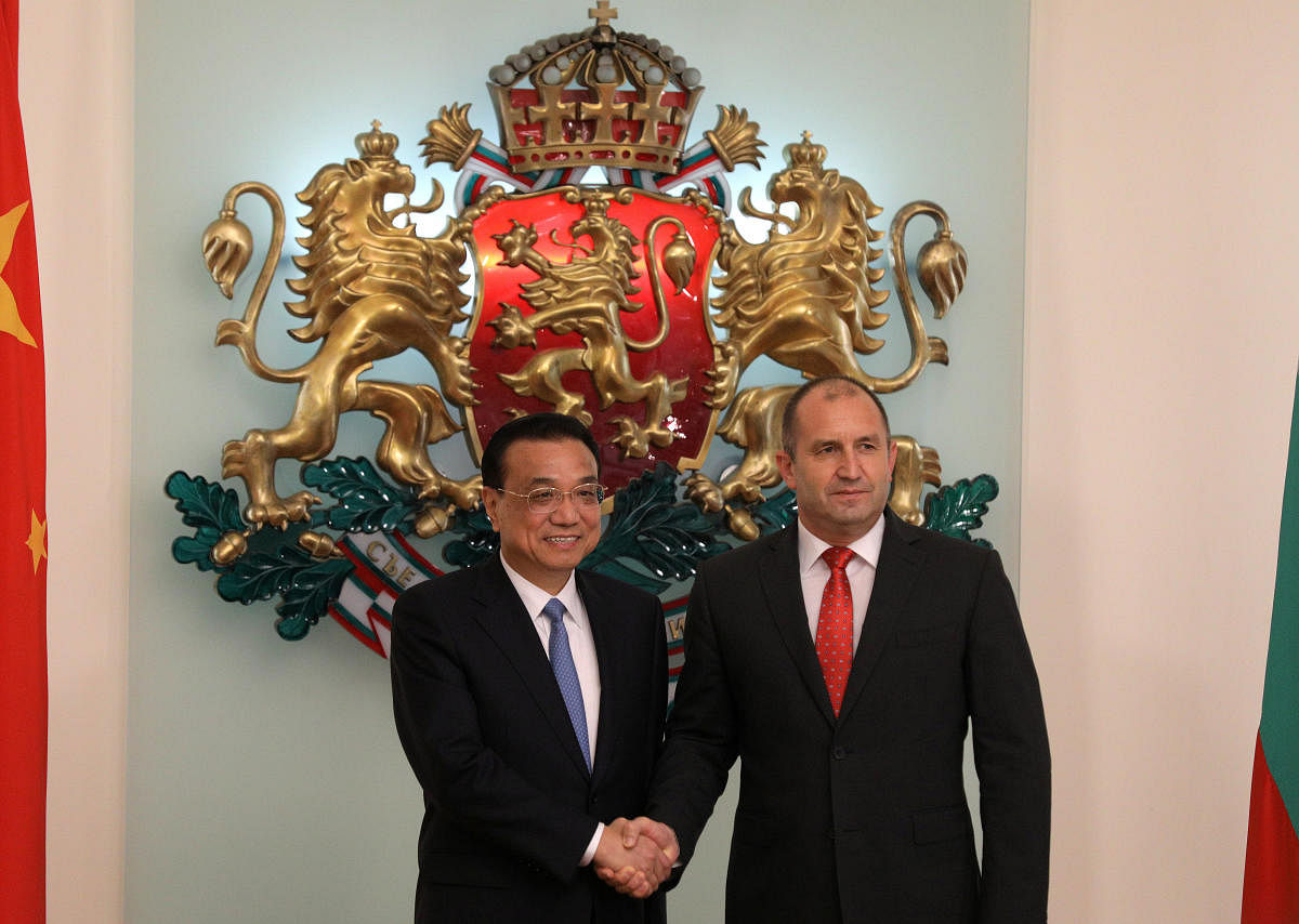 Chinese Premier Li Keqiang poses for a picture with Bulgarian President Rumen Radev in Sofia, Bulgaria. Reuters