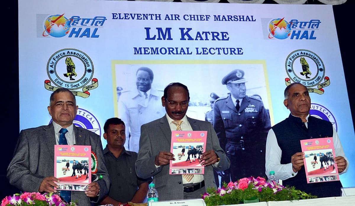 ISRO chairman K Sivan (centre) and HAL chairman T Suvarna Raju (right) at the 11th Air Chief Marshal L M Katre memorial lecture at the HAL Convention Centre in Bengaluru on Saturday. 