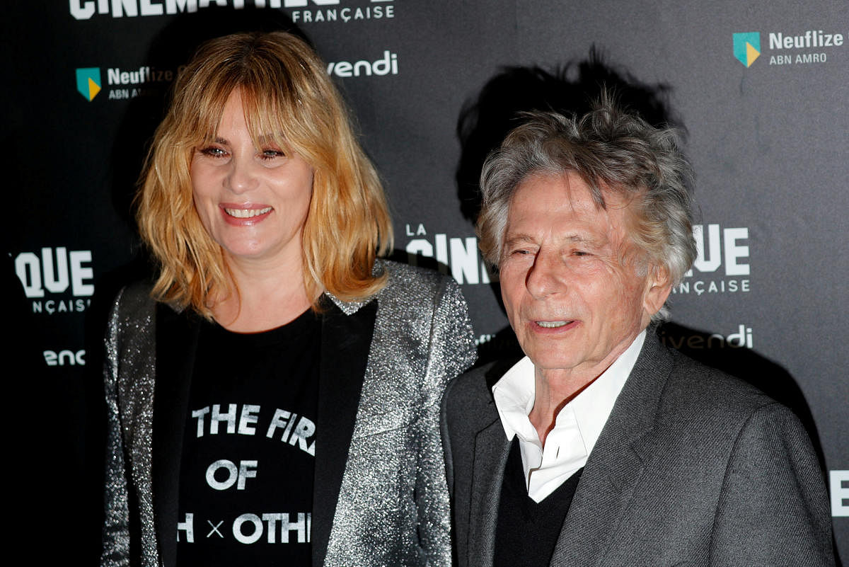 French actor Emmanuelle Seigner and director Roman Polanski pose together prior to the screening of Polanski's movie "D'apres une histoire vraie" (Based on a true story) at the Cinematheque in Paris, France. Reuters file photo.