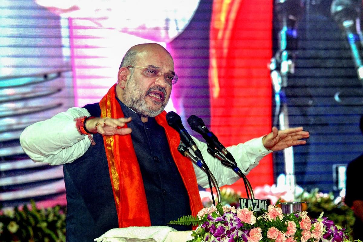 Amit Shah, who was met with a rousing welcome by party cadres, will hold an interactive session with members of the Sakthi and Maha Sakthi Kendra. (PTI file photo)